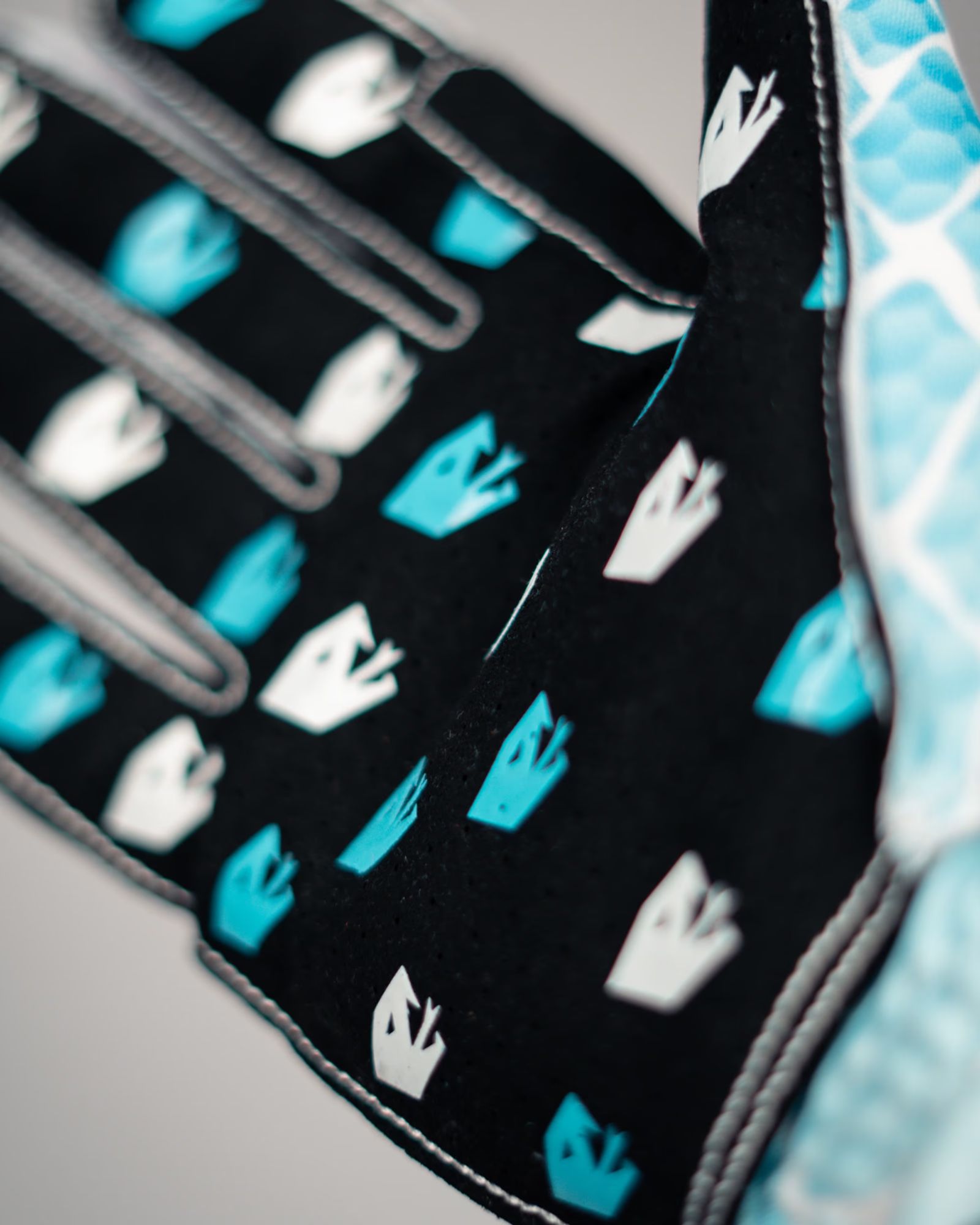 Close-up of the V2 Ice Serpent palm, showing the grip pattern and finger seams.